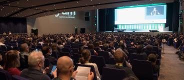 A person speaking at a congress