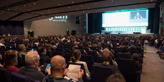 A person speaking at a congress